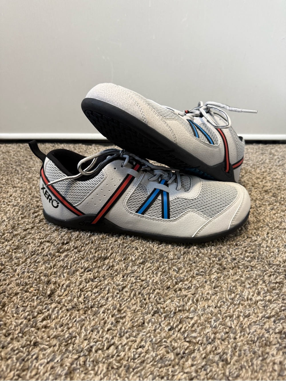 Xero Men’s Light Gray Athletic Shoes with Blue & Red Accents